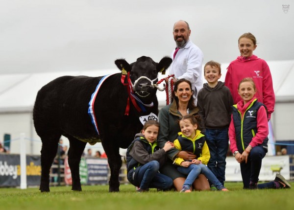 Alexander family pictured at Balmoral Show after winning the commercial championship